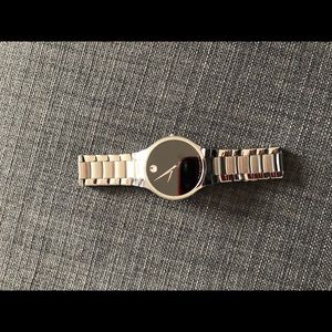 Movado men’s watch, battery, Swiss made, blackface